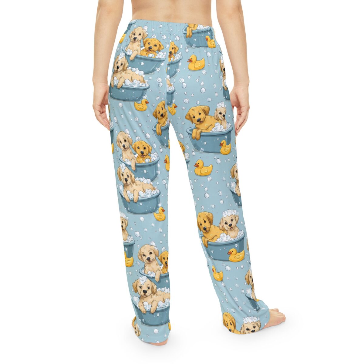 Cute golden retriever puppies in bathtubs with rubber ducks, all over print pajama pants with bubbly blue background.