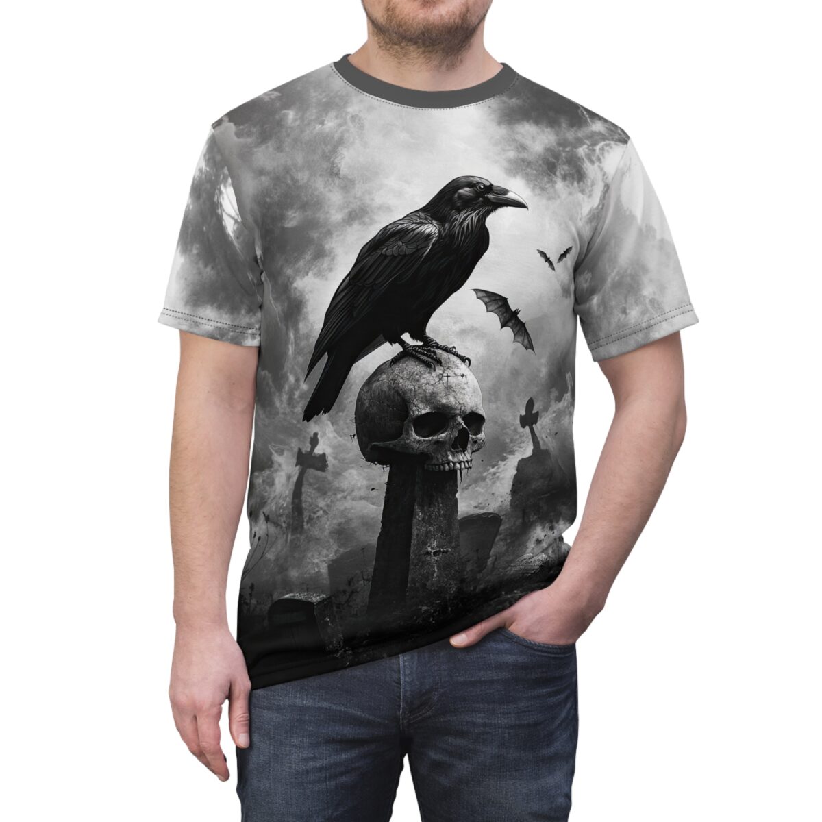 Gothic all over print t-shirt featuring a raven perched on a skull, with bats and tombstones in a graveyard scene.