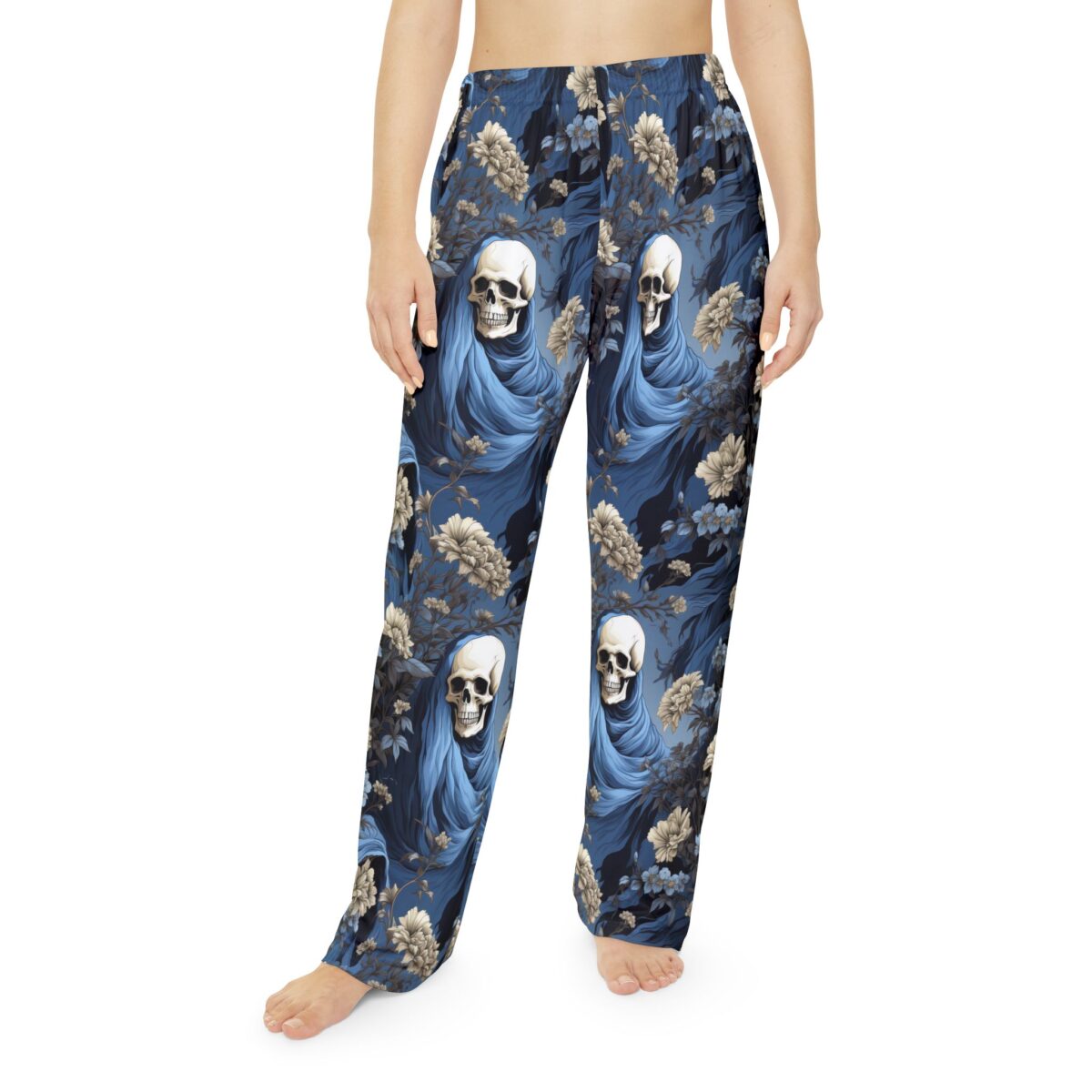 Skull and floral all over print sublimation lounge pants featuring a dark blue seamless wrap around graphic design.
