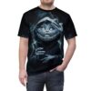 All over print black sublimation tee featuring a smirking, hooded Cheshire Cat graphic with glowing eyes and smoke detail.