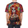 Vibrant all over print sublimation tee featuring a colorful Day of the Dead sugar skull woman graphic with roses and papel picado.
