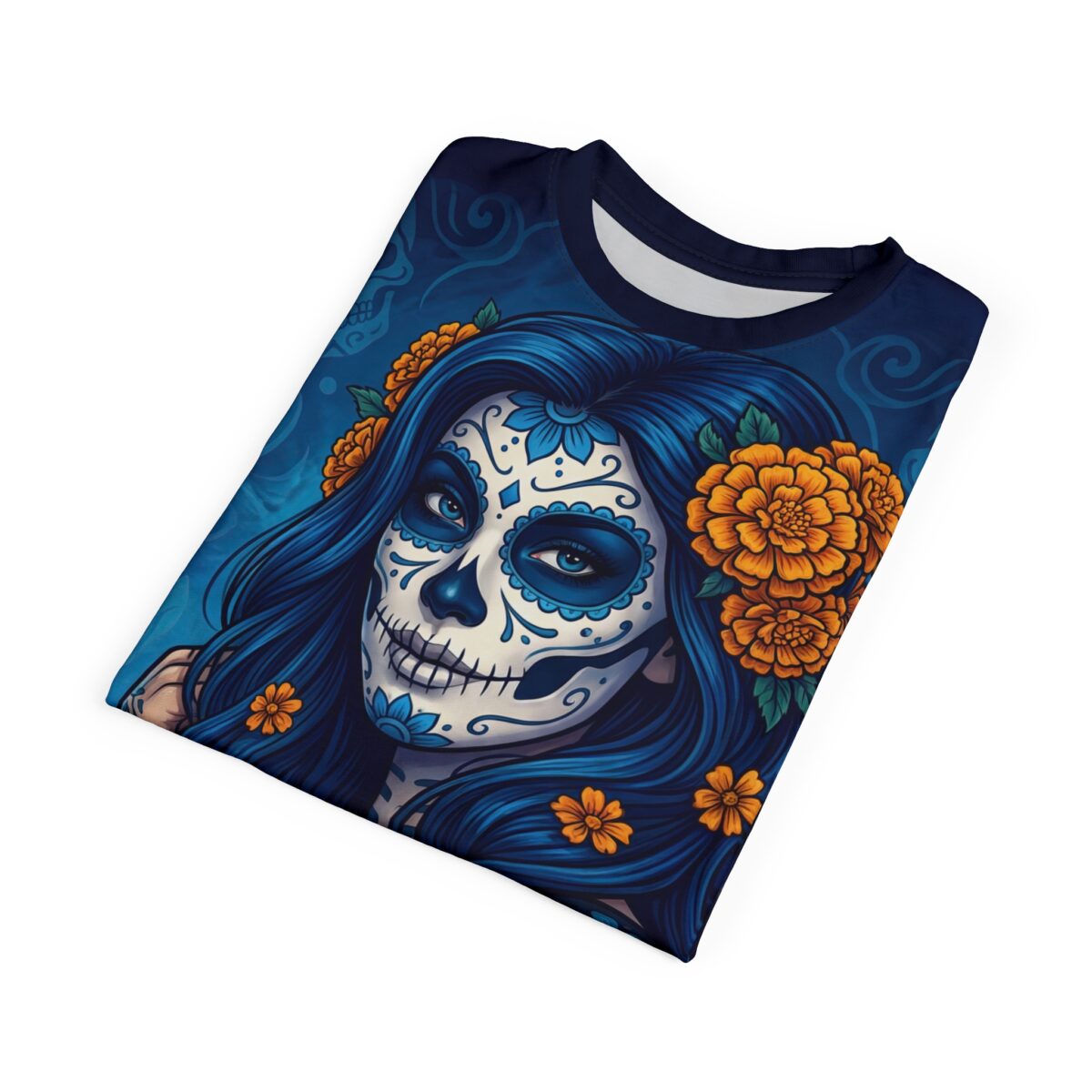 Women's sublimation tee featuring a blue sugar skull with orange marigolds and intricate floral patterns, perfect for Dia de los Muertos.