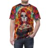 All over print sublimation tee featuring a vibrant sugar skull woman with floral accents and papel picado background.