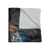 Close up tiger face sherpa fleece blanket with a dark, textured background and blue light accents. Features realistic fur detail.