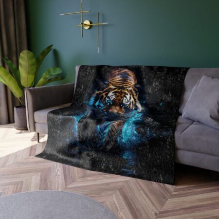 Fleece blanket featuring a fierce tiger with glowing blue eyes emerging from dark water, detailed mystical jungle graphic.