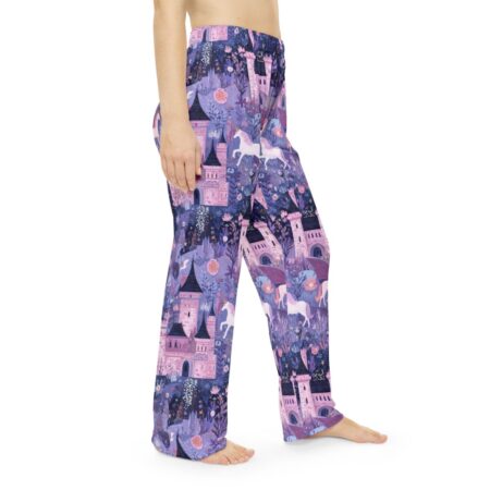 Whimsical unicorn and castle all over print pajama pants featuring a magical purple fantasy landscape.
