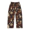 Dark floral print pajama pants featuring an all-over pattern of vintage-style cats and flowers. Offers a whimsical, retro aesthetic.