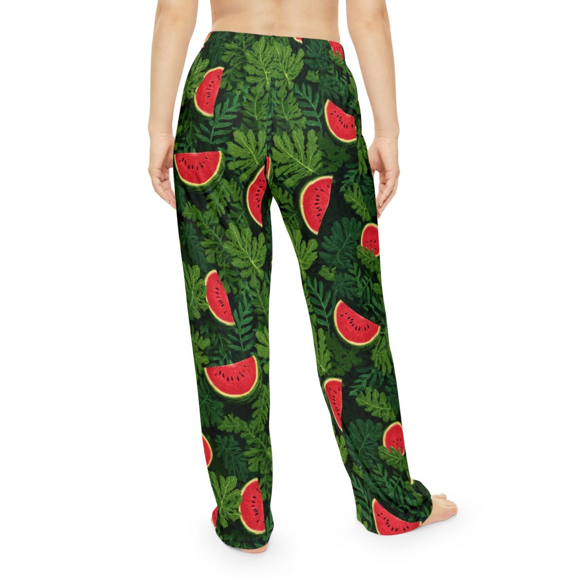 All over print pajama pants with a seamless wrap around graphic of watermelon slices and green leaves.