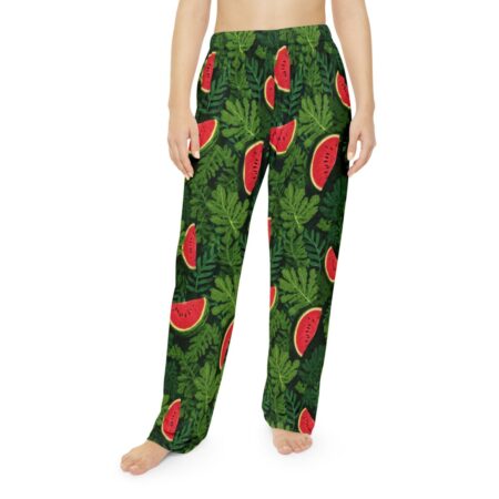 Watermelon slices and green leaves all over print pajama pants with a seamless pattern.