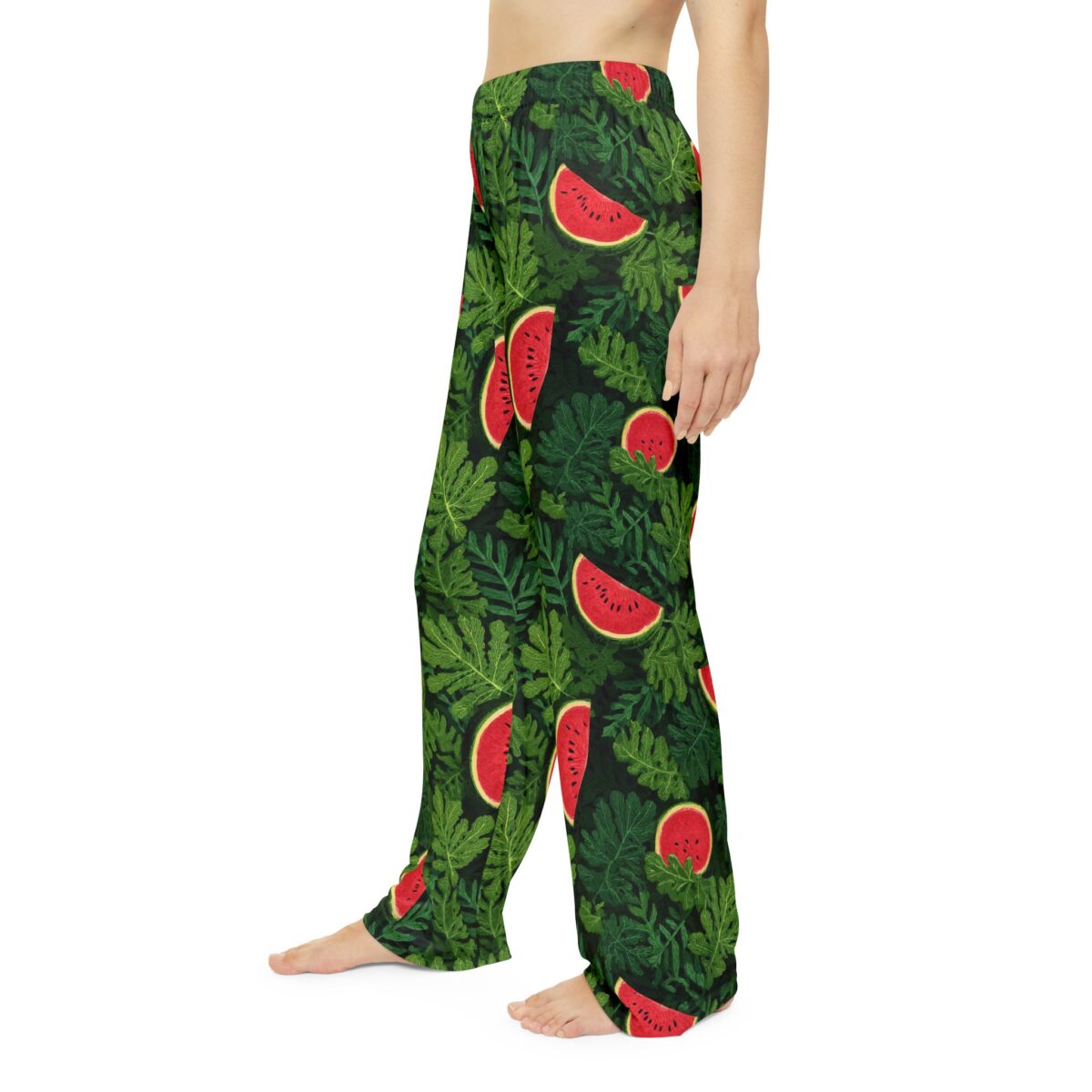 Black pajama pants with all over print of red watermelon slices and green leaves, featuring seamless wrap around graphic.