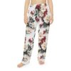 White pajama pants with a seamless all-over print of cream flowers, red berries, and green leaves.