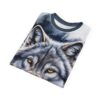 Close-up of a grey wolf with intense yellow eyes on an all-over print sublimation tee.