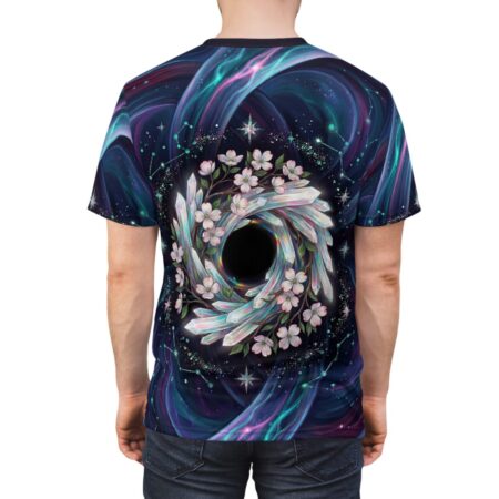 Galaxy swirl all over print sublimation tee featuring crystals and pink flowers surrounding a black hole center.
