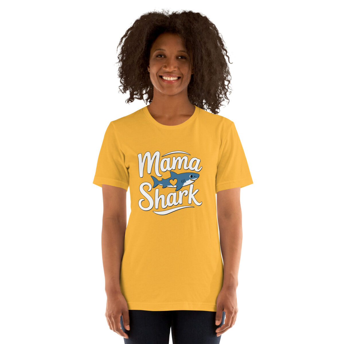 Yellow crewneck t-shirt with 'Mama Shark' text and a cartoon shark graphic with a heart inside. Ideal for mothers and shark lovers.