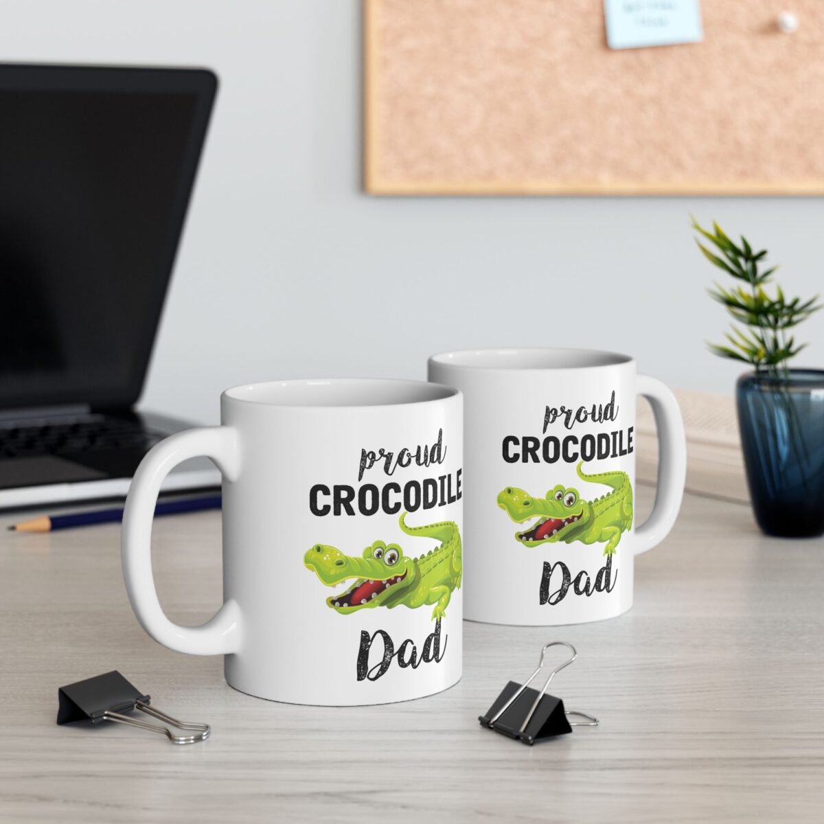 White ceramic mug with 'Proud Crocodile Dad' text and a cartoon crocodile graphic, perfect for fathers.
