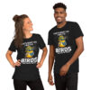 Dark grey t-shirt with a humorous graphic of a bird wearing sunglasses and a hat, holding binoculars, with text 'That's What I Do I Watch Birds And I Know Things'.