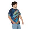 Blue dragon sublimation tee with fiery mane and scales, featuring a vibrant all over print design.