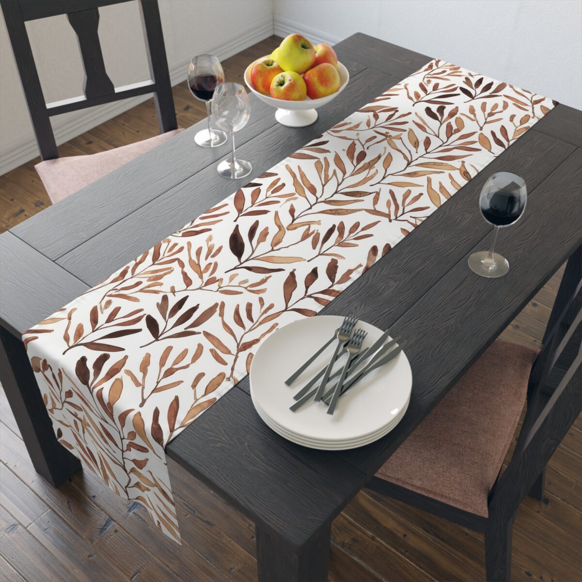 Table runner with a repeating watercolor brown leaf pattern on a white background, ideal for autumn dining and rustic home decor.