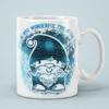 Blue Christmas gnome coffee mug displaying snowflakes and It's The Most Wonderful Time Of The Year text.
