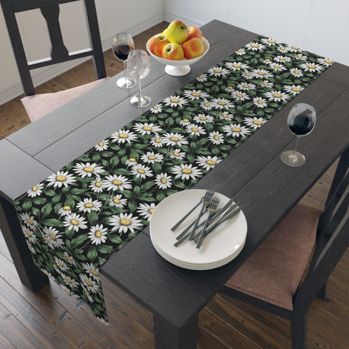 Black table runner with a seamless white daisy floral print and green leaves pattern.