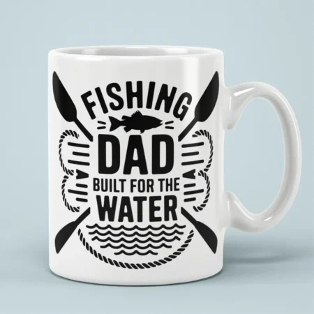 White ceramic mug displaying black Fishing Dad Built For The Water graphic with fish and crossed oars.