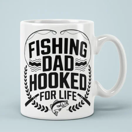 White ceramic coffee mug printed with bold black Fishing Dad Hooked For Life graphic artwork and bass fish icon.