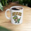 Funny green dinosaur graphic mug with the text 'I HAVE NO IDEA WHAT I'M DOING' in yellow.