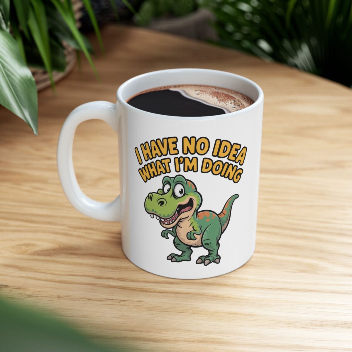 Funny green dinosaur graphic mug with the text 'I HAVE NO IDEA WHAT I'M DOING' in yellow.