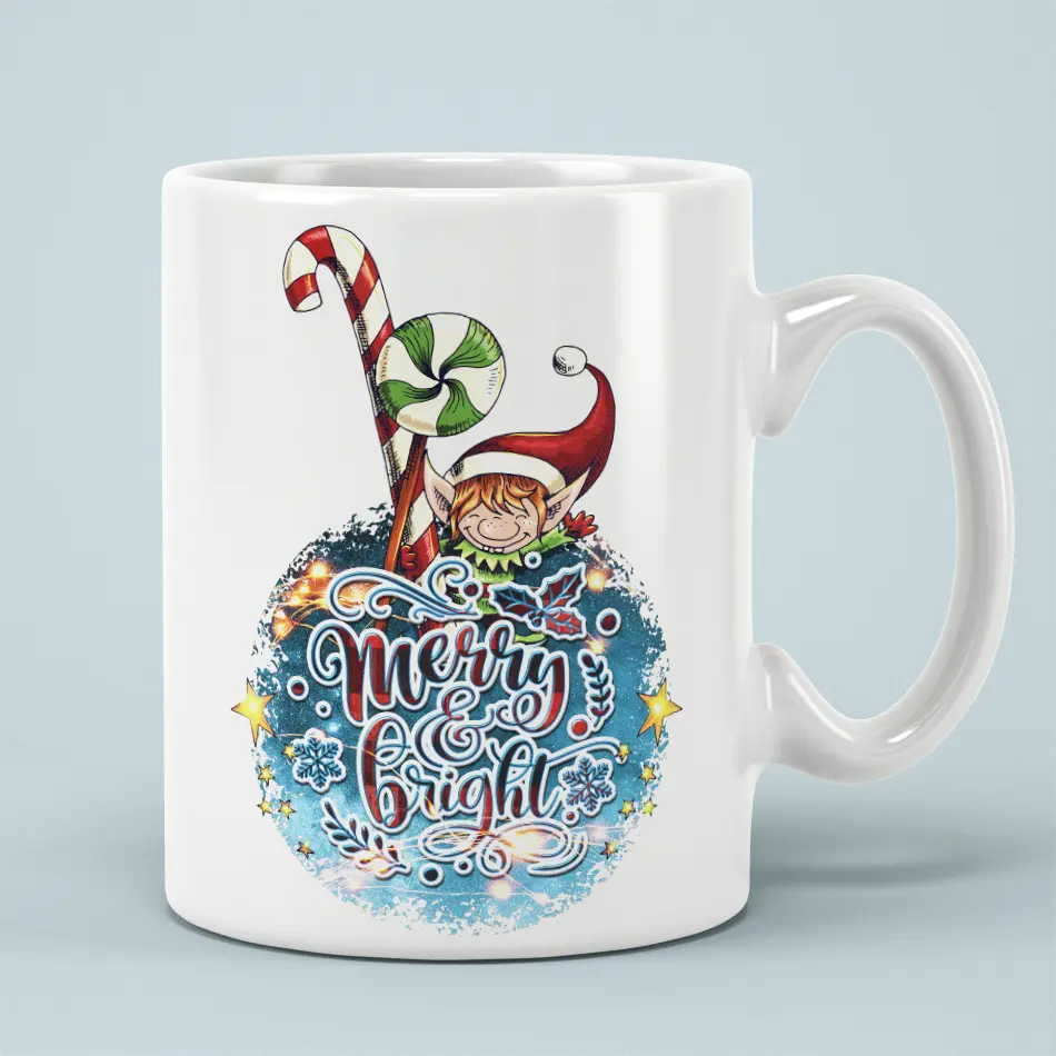 White ceramic mug printed with a festive Christmas elf, peppermint swirl candy cane, and Merry & Bright typography.