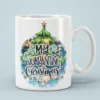 White ceramic mug with a green Christmas tree illustration and My Quarantine Christmas text design.