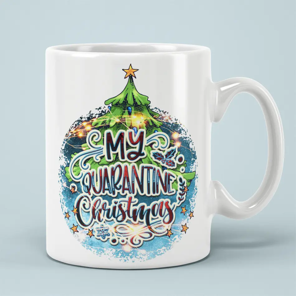White ceramic mug with a green Christmas tree illustration and My Quarantine Christmas text design.