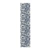 Navy blue fabric runner featuring a vintage floral pattern with cream-colored flowers and leaves.
