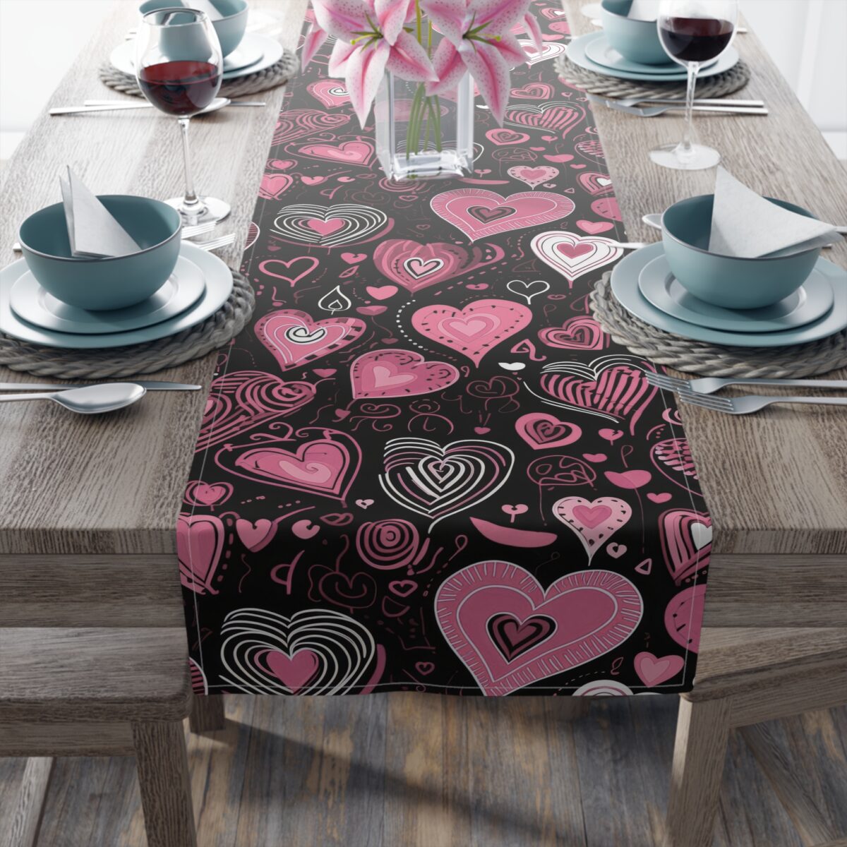 Pink hearts and doodles on a black all-over print table runner, perfect for Valentine's Day decor or romantic settings.