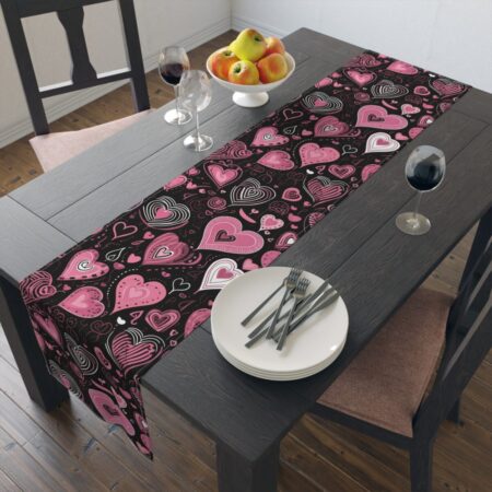 Black table runner featuring a seamless pattern of pink and white sketched hearts and swirls for Valentine's Day decor.