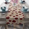 Red floral and botanical pattern table runner featuring a vintage aesthetic on a neutral background.