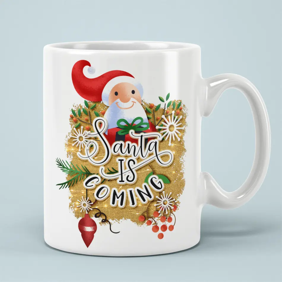 White ceramic coffee mug decorated with a smiling Santa illustration, golden burlap texture, snowflakes, and holiday lettering.