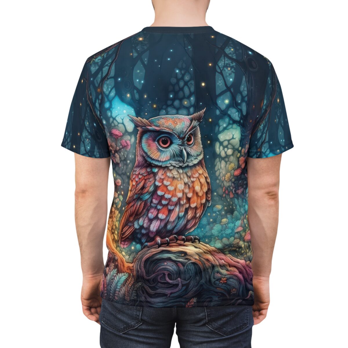 Vibrant all over print sublimation tee featuring a colorful owl on a mystical forest branch, with glowing accents and dark trees.